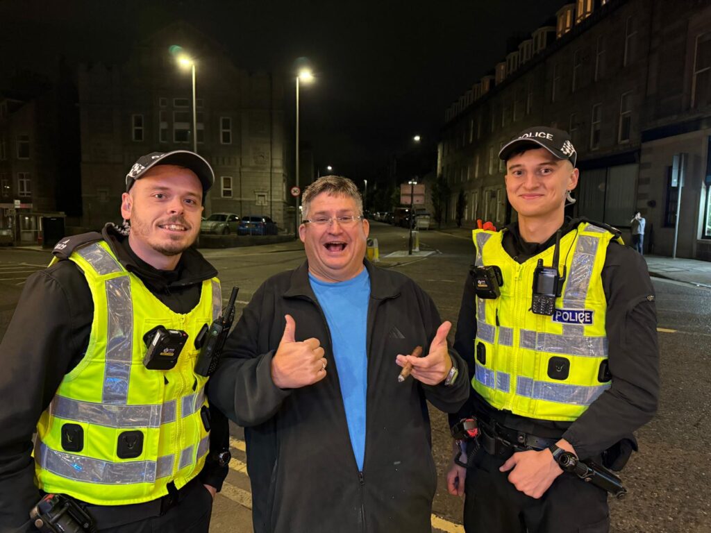 Keith Graham's tradition of pics with the Police