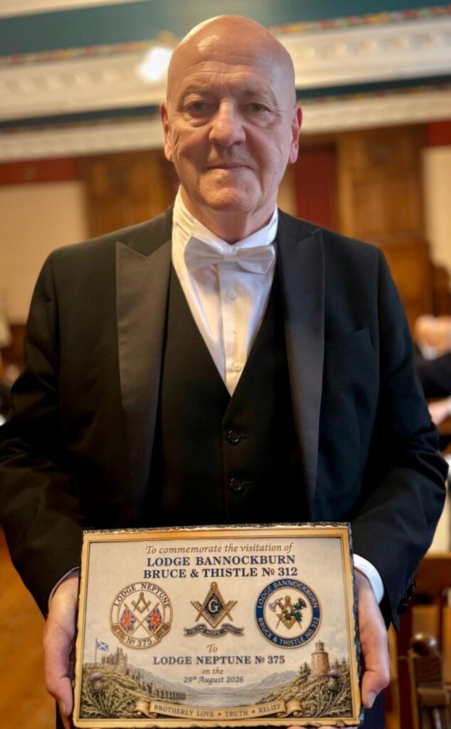 RWM Bro. Kenneth R Shaw with the gift from RWM Bro. Alan Duck